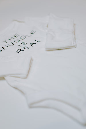 
                
                    Load image into Gallery viewer, &amp;quot;The Snuggle Is Real&amp;quot; Long Sleeve Bodysuit // White (Newborn)
                
            