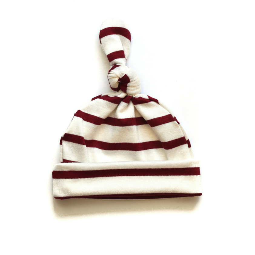 
                
                    Load image into Gallery viewer, Top Knot Baby Hat // Ruby Red &amp;amp; Cream (0-3 months)
                
            