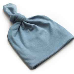 
                
                    Load image into Gallery viewer, Top Knot Baby Hat // Steel Blue (0-3 months)
                
            